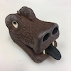 esteefee: a ceramic dragon head looking goofy (dragoon)