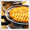 grundyscribbling: wafflemaker with waffle ready to go (food - waffle)