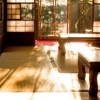 starfallhaven: The interior of a traditional Japanese home with a table on some tatami mats. Sunlight coming through the shoji doors lights the room warmly. (Yuki)