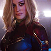 glinda: Carol Danvers backlit with a little smile in her Captain Marvel uniform (captain marvel)