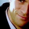 flyakate: Eddie Cahill smiling (complete by another's smiles Don Flack)