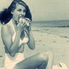 gildaintaiwan: Rita at a beach eating a sandwich (Rita eating)
