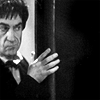 auroracloud: a man (the Second Doctor from 1960s Doctor Who) sneaking or hiding behind a corner (sneaky Two)
