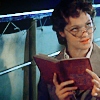 suncani: Evy from the mummy reading a book and glaring (evy reading)