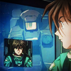 turlough: young man in foreground looking at another in a small viewscreen, Duo & Heero from 'Gundam Wing' ((gw) parternship)