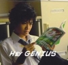bakamegami_sama: Akaya holding a book upside down with white text from his song Chacha to Tsubusuze ("Hey GENIUS") (Default)
