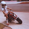 esteefee: Pic from Joes Insta, weeJoe on a minibike and wearing white helmet turning a corner in full throttle. (minijoe)