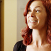 st_aurafina: white woman with red hair, she looks gleeful (POI: Grace excited)