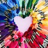 ysilme: Embroidery yarn in rainbow colours forming a heart. (Creative rainbow)