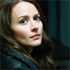 st_aurafina: Woman facing camera, dark hair, solemn expression (POI: Root renaissance)