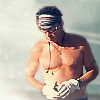 em_kellesvig: Joe naked from the waist up on a blue-green background (jf_chest)