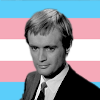 evilinsanemonkey: Illya Kuriyakin in front of the trans flag (MFU: Trans Illya)