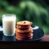 grundyscribbling: stack of chocolate chip cookies, glass of milk (food - cookies and milk)