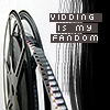 aurumcalendula: black and white image of a film reel with the caption 'vidding is my fandom' (vidding is my fandom)