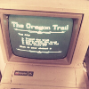 peoriapeoriawhereart: early PC with text of game (Oregon Trail)