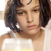 ampersand: Mathilda, looking at a glass of wine. (Mathilda - underage drinking)