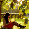 fullupwithfire: a person sitting under trees, a book on their knees (pic | all on a midsummer morn)