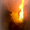 muccamukk: Héloïse's faceless portrait in the hearth, a real flame rising from her painted heart. (Lady on Fire: Burning Art)