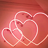 bellflower: Three neon pink light hearts in increasing size ([Misc] Three times the love)