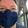 audrey_eee: Selfie wearing a mask, on a bus (Default)