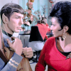 tigerlily: TOS edition Spock and Uhura gazing at each other over his lyre, which he holds in his lap. (Spock/Uhura lyre)