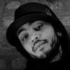 frausorge: Travie McCoy in a hat with his head tilted to the side and a contemplative expression, in a black and white photo (steady as she goes)