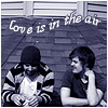 frausorge: Jon Walker and Spencer Smith sitting on a rooftop with text "love is in the air" (hang time)