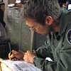 ankh: (SG1 Daniel writing)