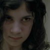 halfwitch: little girl, face shadowed, staring up (But now I have the power to win)