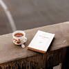 sewn: (a cup of tea and a book)