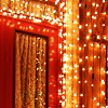 juniperphoenix: Red door covered with gold fairy lights (Door 8)