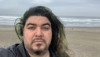 lemasquegris: picture of me unmasked with the Pacific Ocean behind me. (self)