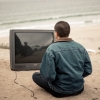 darthbloodorange: Person sitting in front of a TV on a Beach (Moves &amp; TV)