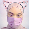 mx_rumpleteazer: A Muslim wearing a light pink hijab with a light pink face mask and pink rose cat ears. (cat hijab)
