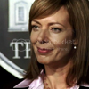 shallowness: CJ smiling before obscured logo (CJ at work TWW)