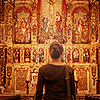 tropicsbear: Angela from the Constantine movie standing in front of a wall of religious displays (DC: Angela in front of religious display)