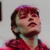 aphrodite_mine: (allison ponthier - red suit)