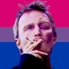 ambiguouslydisordered: Jesse Pinkman from Breaking Bad with a bisexual flag behind him. (Default)
