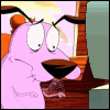 bee: A gif of Courage the Cowardly Dog typing on a desktop with his usual expression of anxiety. (Writing Mode)