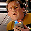 mustsuffer: Miles holds a tricorder and looks puzzled (Default)