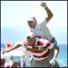 mayhap: Patrick Mahomes riding on Travis Kelce's back (piggyback)