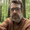 jeffy: headshot of me, bearded, graying, among tall trees and green understory (headshot, me, trees)