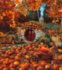 ext_18524: hobbit hole with pumpkins, adirondack chairs, and wheelbarrow (Default)