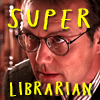 linky: Close up on Glies' face, a focused expression, text saying "Super Librarian" (giles 2)