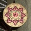 crafty_packrat: Heart design on whorl of a polymer clay spindle (Default)