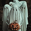 reeby10: five sheet ghosts standing in a bunch with the front ghost holding a jackolantern (halloween)