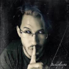 stormhelm: an eldritch entity in the form of a mixed-race human, with dark blue-black hair and black eyes that shine silver where the irises should be. the being leans close and holds a finger to its lips. the world around it is shadowed and fuzzy. (dauk)