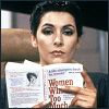 pauraque: Marina Sirtis in costume as Deanna reads Women Who Love Too Much on the Enterprise bridge (st women who love too much)