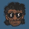 tempural: Man with jheri curl and small moustache and black glasses (Tiger Herbie)