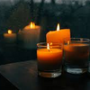 flamingsword: Three lit candles in front of a window with twilight woods beyond (Candles)